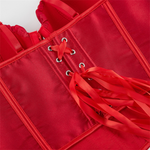 lacet d'attache d'un corset rouge 
