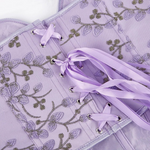 lacet et œillet d'un corset violet pour femme