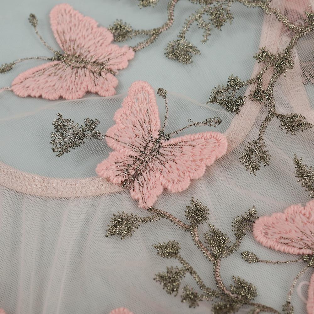 Corset dentelle motif papillon